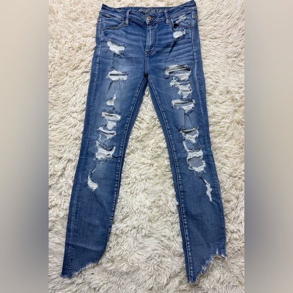 EUC Incredibly Distressed American Eagle Super Highrise Stretch Jegging Size 10 - Picture 1 of 12